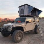Hard shell rooftop tent for SUV