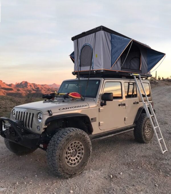 Hard shell rooftop tent for SUV