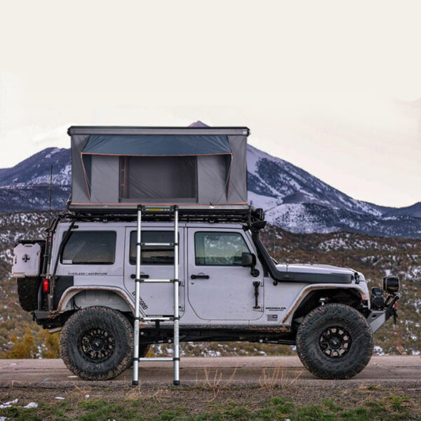 Hard shell rooftop tent for SUV