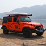 Vertical pop-up rooftop tent for SUV