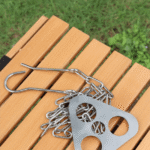 Adjustable stainless steel campfire tripod board for outdoor cooking